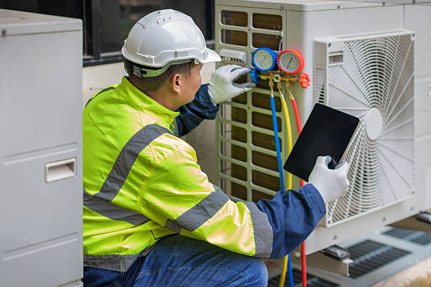 Professional Heat Pump Repair technician working in Santa Fe, TN